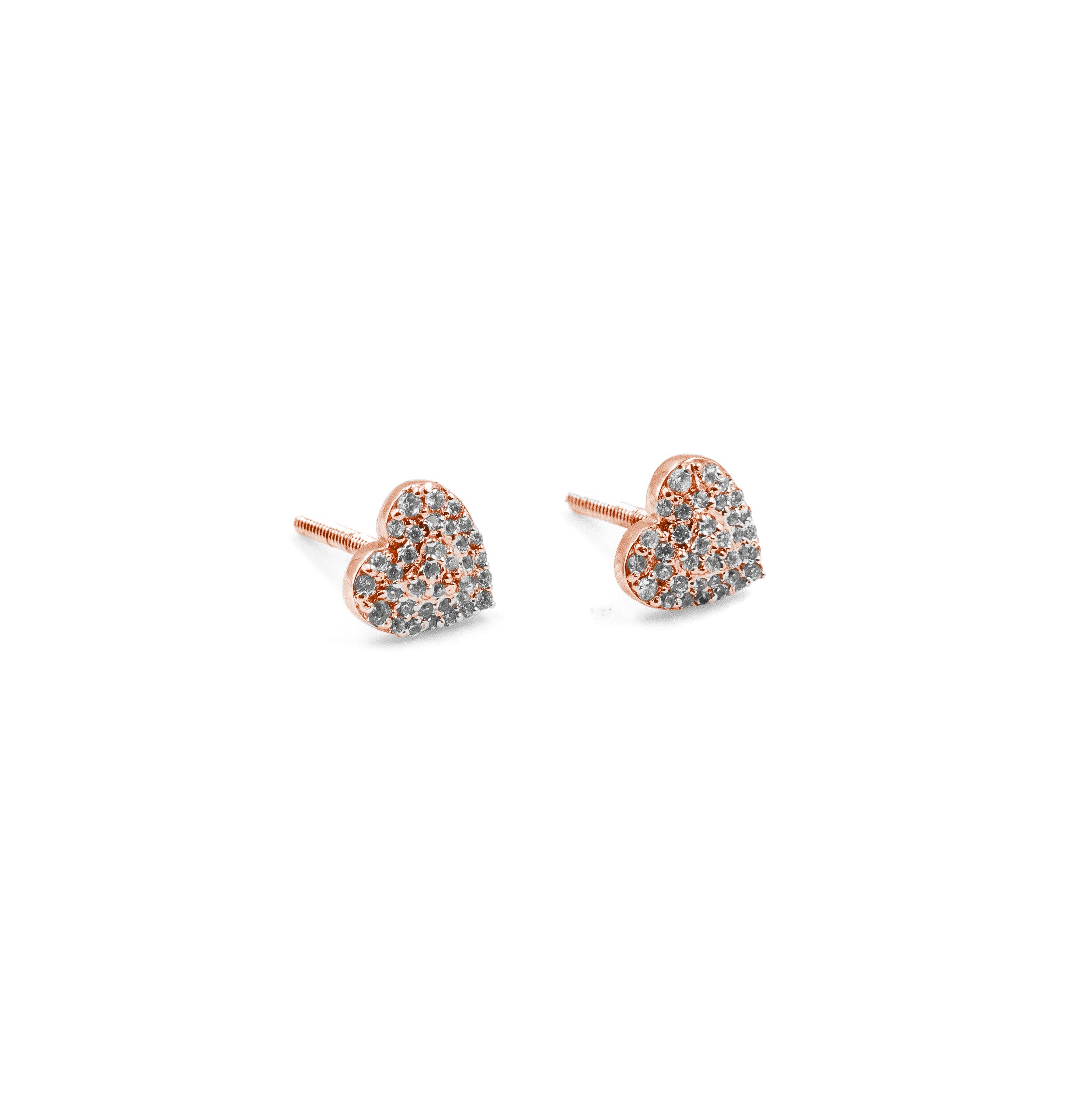 Heart-shaped earrings with rose gold and clear gemstones on a white background